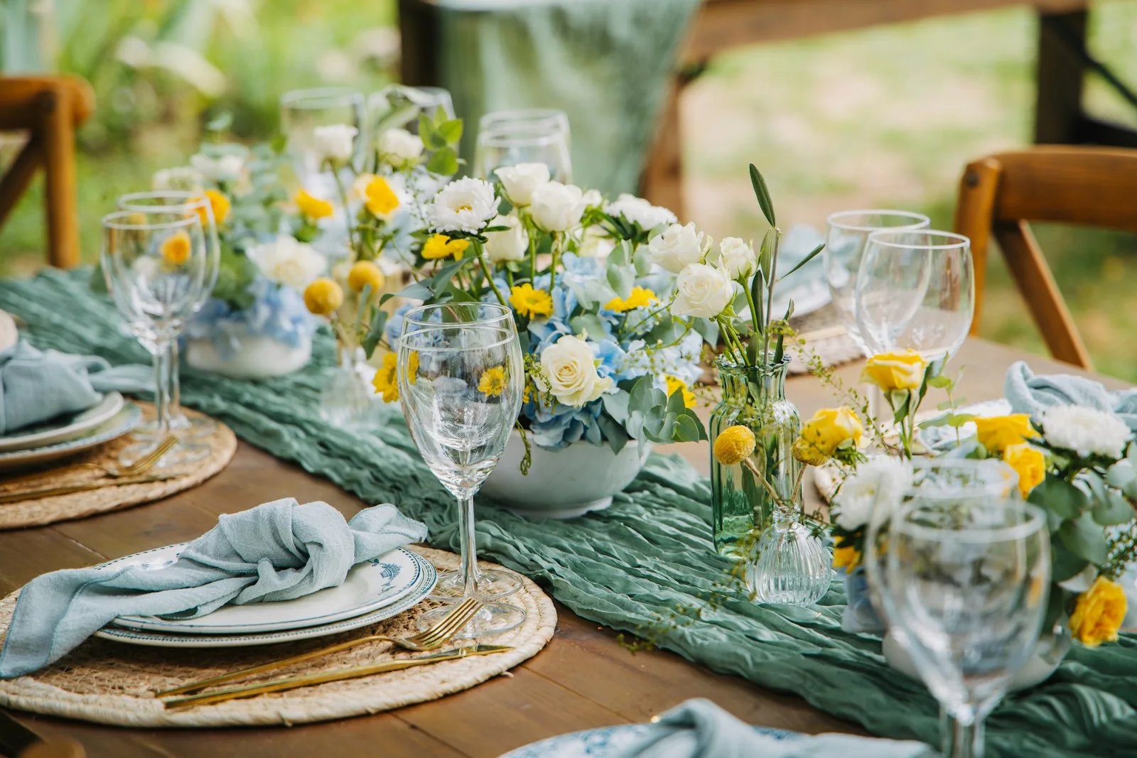 Floral table setting with plates and glasses