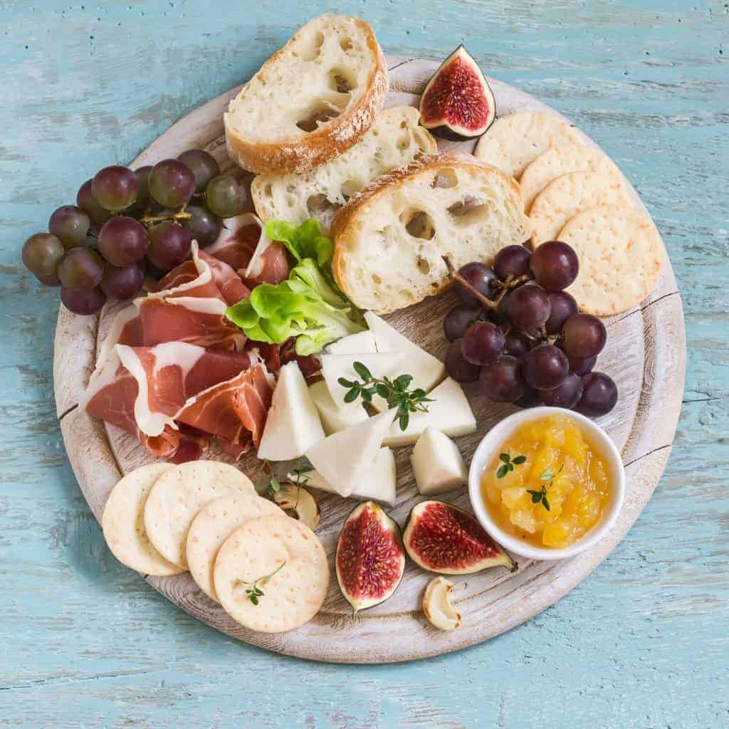 How to make a charcuterie board with meats and cheese.