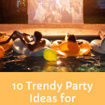 Friends on floats in a pool looking at an outdoor movie screen.